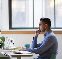 Man learning at laptop